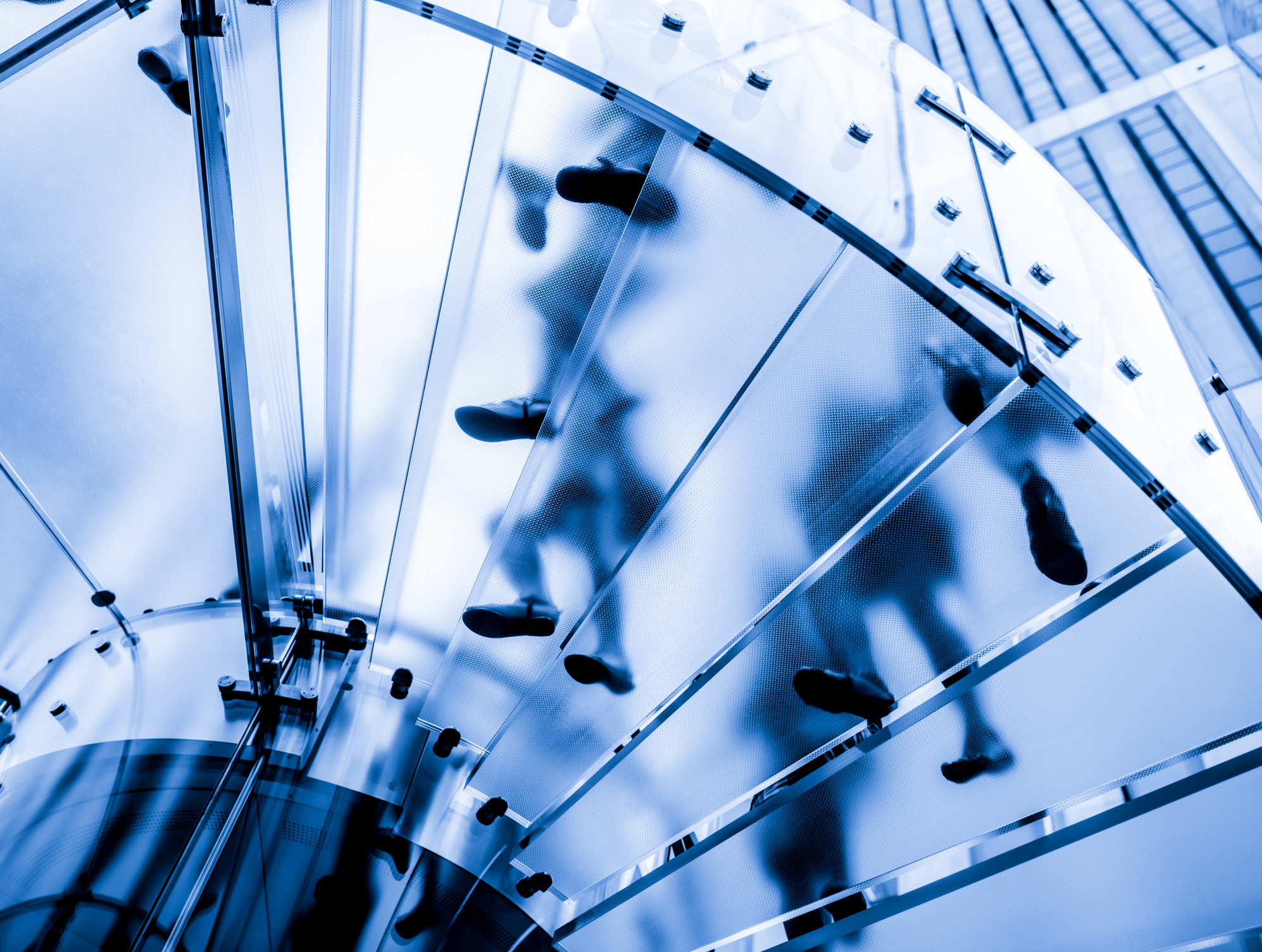 Dark blue tint on glass staircase