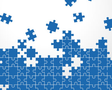 Jigsaw puzzle pieces fall into place.
