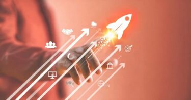 Growth strategy busines trend concept. Businessman hand on arrow investment icon. Increase sale marketing, increase success potential, soar rocket towards wealth. Competitive business goal plan